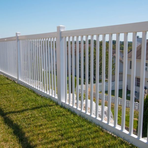 White vinyl picket fence