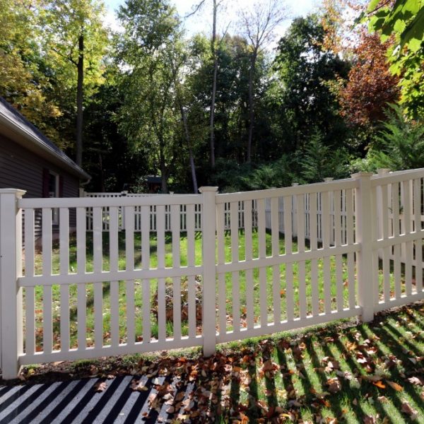 White vinyl picket fence