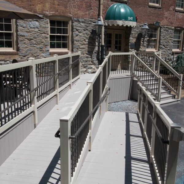 Handicap ramp with tan vinyl guard rails