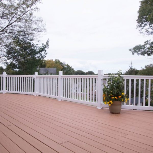 Large deck with white vinyl railings