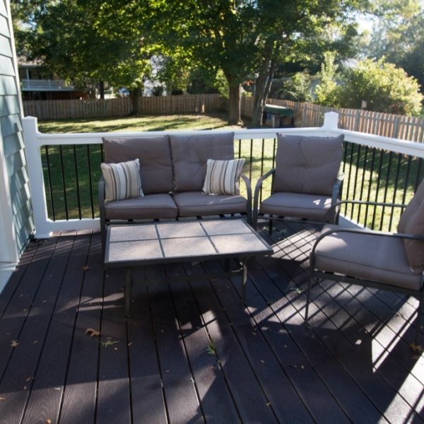 Small brown deck with white vinyl rails