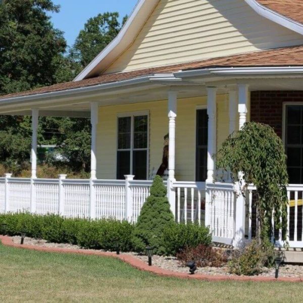 Rancher with white vinyl rails