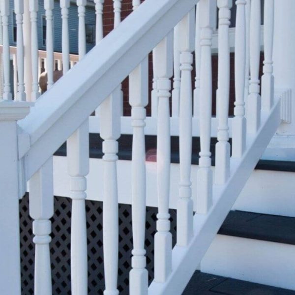 Composite deck steps with white vinyl hand rail