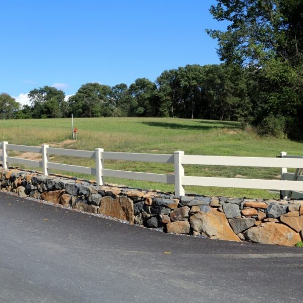 White vinyl 2-rail fence