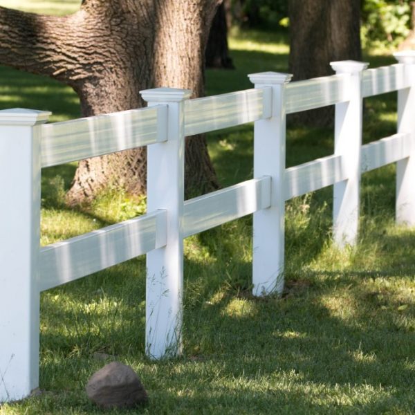 White vinyl two-rail fencing