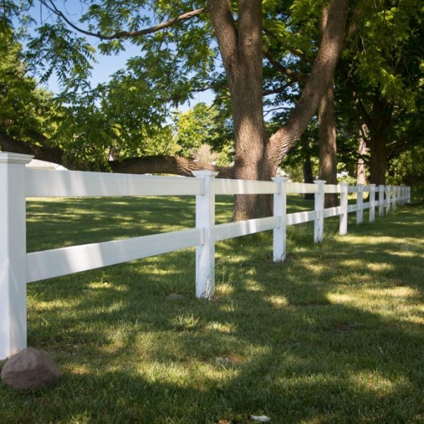 White vinyl two-rail fence