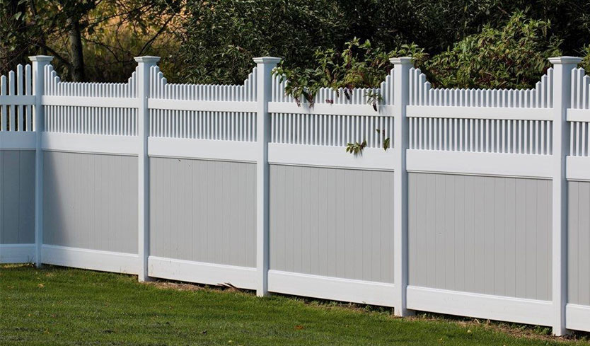 gray and white vinyl fences