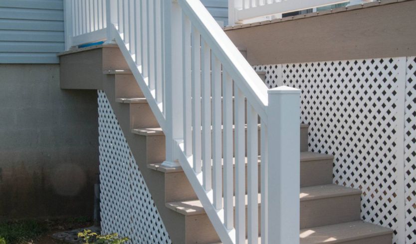 White vinyl simple porch fence railing